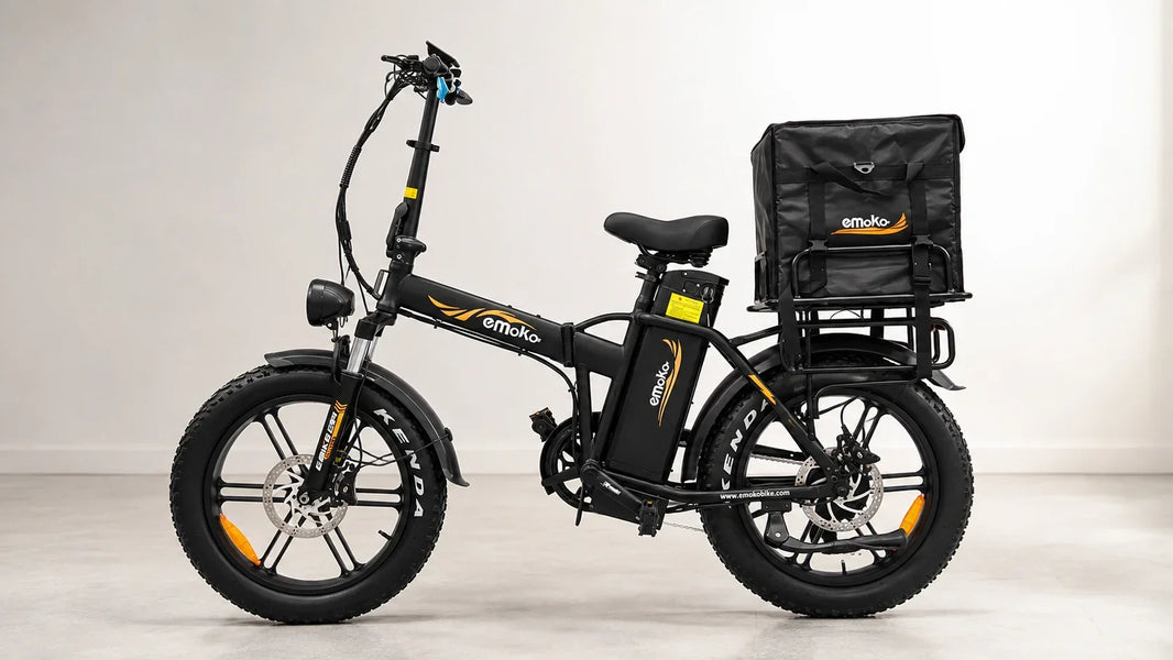 Emoko C94 folding e-bike with a rear cargo bag, illustrating how rider weight and cargo can affect real-world e-bike range.